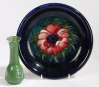 A Moorcroft pottery dish, decorated in the anemone pattern, 22cm diameter, a Moorcroft made for