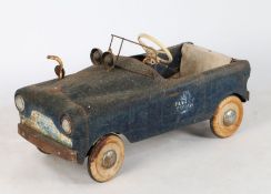 A mid 20th Century steel bodied Triang police pedal car, the body with "Flying Squad" livery, 98cm