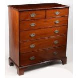 A 19th Century mahogany chest of two short and four long drawers, the beaded handles with beaded and