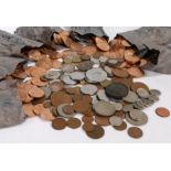 A collection of coins, to include half pennies and one pennies, in bags, with some foreign