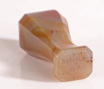 Elveden Hall- A cloudy-grey agate desk seal, circa 1900, of inverted baluster form with chamfered