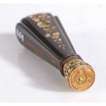 A 19th Century tortoiseshell and gilt metal desk seal, the fluted tapering handle with gilt