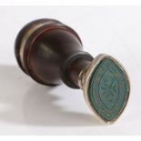 A second quarter of the 19th Century white metal, lignum vitae and bloodstone desk seal, the