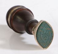 A second quarter of the 19th Century white metal, lignum vitae and bloodstone desk seal, the