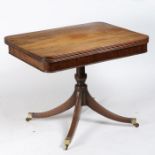 A Unusual George III mahogany swivel top breakfast table, the rectangular top with a reeded edge