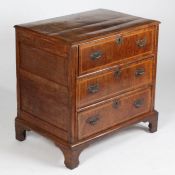 A George II walnut chest of drawers, the rectangular cross banded top above three long drawers