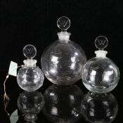 A group of 3 Rene Lalique Dans La Nuit graduated stars perfume bottles made for 'Worth'. 12.5 fl.oz,