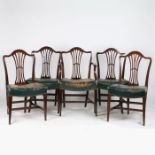 A set of Ten 19th century Hepplewhite dining chairs, to include two carvers and eight singles,