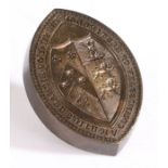 A brass seal matrix engraved by Halfhide Coventry St. of navette form, the central field engraved