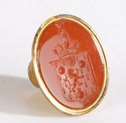 An early 19th Century gilt metal and carnelian desk seal matrix, circa 1801, the cylindrical gilt