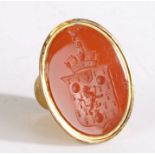 An early 19th Century gilt metal and carnelian desk seal matrix, circa 1801, the cylindrical gilt