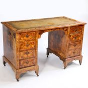 A 19th century dutch marquetry walnut desk, having a leather inset top with floral inlaid to the