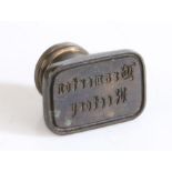 A 19th Century brass seal matrix, the rounded rectangular matrix engraved "Bramerton Rectory", the