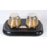 A pair of Victorian silver mounted horse hoof inkwells, London 1874, maker Edward H Stockwell, the