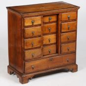 A Good and unusual 18th century walnut chest of drawers of breakfront form, the top set with a