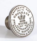 A steel seal matrix, with fluted collar, the oval matrix engraved  with central Crown and