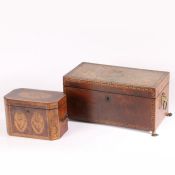 A 19th century mahogany Greek key inlaid tea caddy with internally fitted tea cannisters and glass