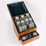A 19th century burr walnut sloped 'Pharmacie' fitted box by Asprey & Sons. The interior  top with