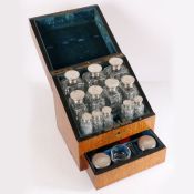 A 19th century burr walnut sloped 'Pharmacie' fitted box by Asprey & Sons. The interior  top with
