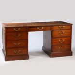 19th century mahogany writing desk, having gilt tooled brown leather inset top, above an arrangement
