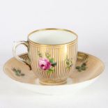 Minton cup and saucer decorated with roses on gold striped ground, impressed mark to saucer, cup