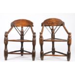 A pair of 18th century ash, beech and pine turner's chairs, English Each of three-post form, with