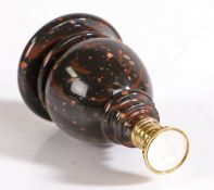 A gold mounted chalcedony desk seal, with mottled brown hardstone baluster handle and part fluted