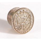 A white metal seal matrix, English, circa 1600, the oval matrix engraved with a coat of arms