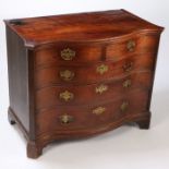 A Good George III mahogany serpentine chest of drawers, having a cross banded top above two short