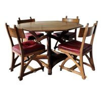 An octagonal oak Gothic Revival table with a set of four chairs designed by Edward Welby Pugin