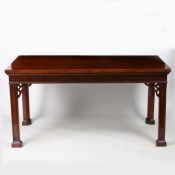 A 18th century mahogany serving table, with a rectangular top above a thumb moulded frieze raised on