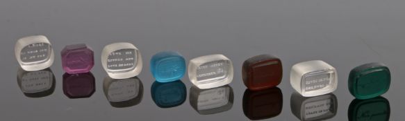 Eight 19th century glass intaglio seals, having greetings and sayings to include four clear and four