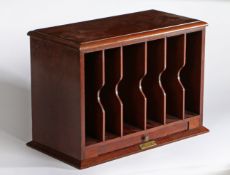 An Edwardian mahogany six division telegram box with slide above plinth base, set with engraved