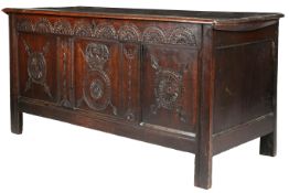 An unusual Charles II oak coffer, Yorkshire, circa 1660 The hinged lid of two wide boards with