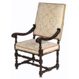 An early 18th century carved walnut and upholstered open armchair, Franco-Flemish, circa 1700-20 The