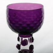 An English 19th Century amethyst roemer glass, circa 1830, the cup with multi applied raspberry