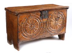 A late 17th century elm boarded chest, West Country, circa 1680-1700 The one-piece hinged lid with