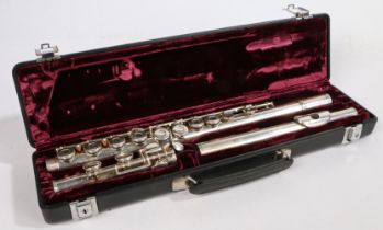 A Gemeinhardt M2S solid silver flute, in three sections, serial no. 407749, 71cm long, cased