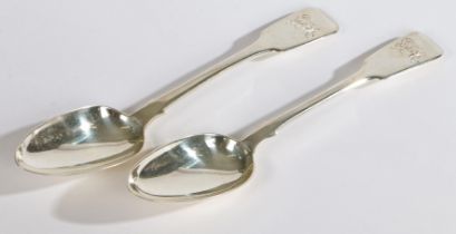 A pair of fiddle pattern, monogramed silver table spoons, London 1833/1836 one by Montague