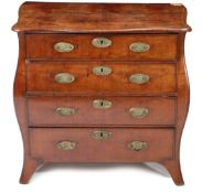 A 18th/19th century mahogany Bombe chest of drawers, having a serpentine top above a bombe body