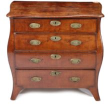 A 18th/19th century mahogany Bombe chest of drawers, having a serpentine top above a bombe body