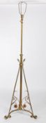 An Arts and Crafts brass and copper standard lamp, in the manner of W.A.S Benson, adjustable