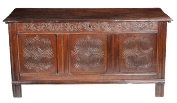 A large Charles I oak coffer, Wiltshire/ Gloucestershire border, circa 1640 The top of two boards,