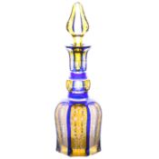 A good 19th Century Bohemian glass decanter, in blue and yellow with scrolling leaf and flower