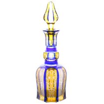 A good 19th Century Bohemian glass decanter, in blue and yellow with scrolling leaf and flower