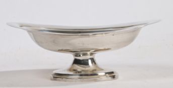 A Victorian silver pedestal bowl, London 1895, maker Walter & John Barnard, of dished oval form,