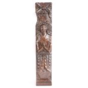 An Elizabeth I/James I carved oak term, circa 1600-10 Designed as a female, her slender arms and