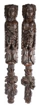 A large and impressive pair of 17th century oak figural terms Each carved as a female, with