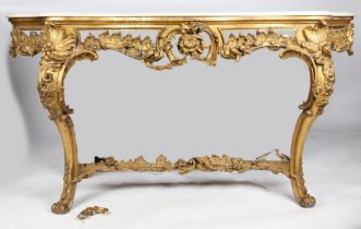 A George III parcel gilt and marble console table, the serpentine white marble top above a scroll,