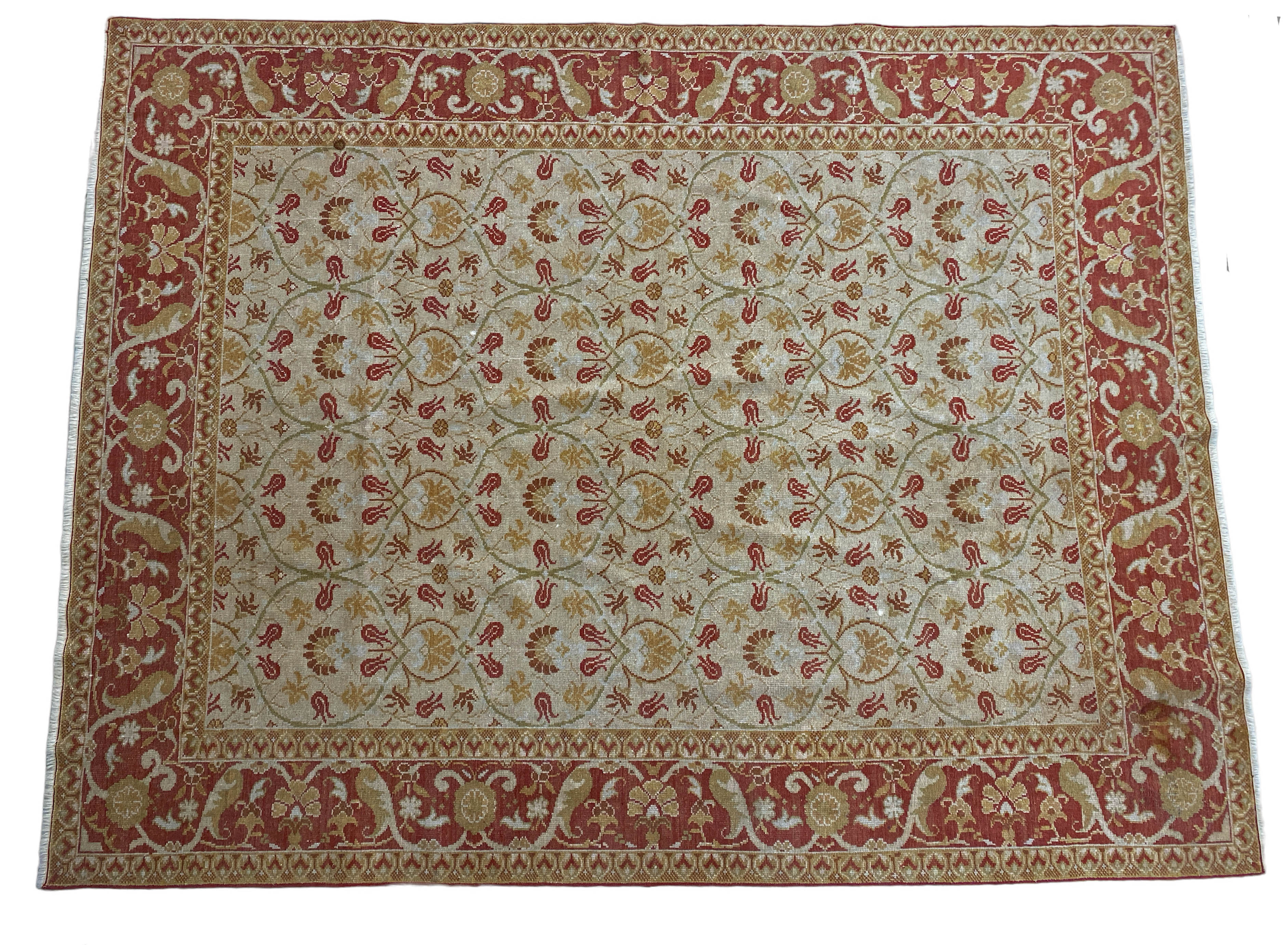 An Oriental Carpet, Probably Turkish the ivory oval lattice field with an all over design of flowing